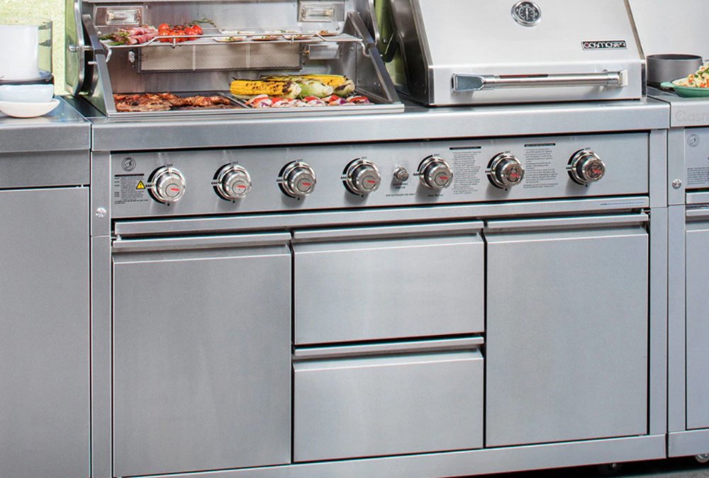Stainless Steel Modular Outdoor Kitchen with Built in Double Grill, Refrigerator, Side Burner, Sink and storage cabinets.